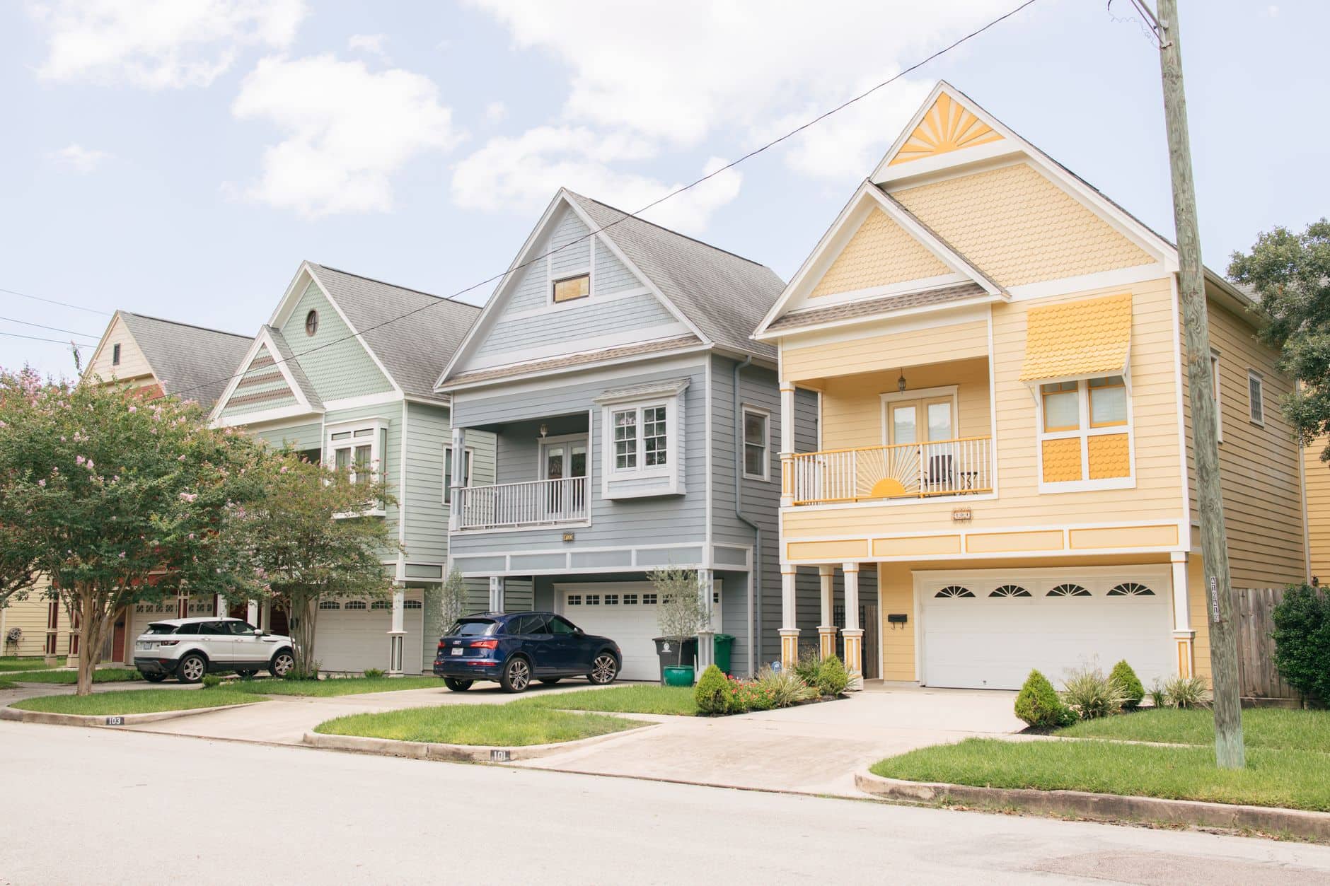 A row of two-story homes along a residential street, the kind of housing stock Houston's home-service trades work in.
